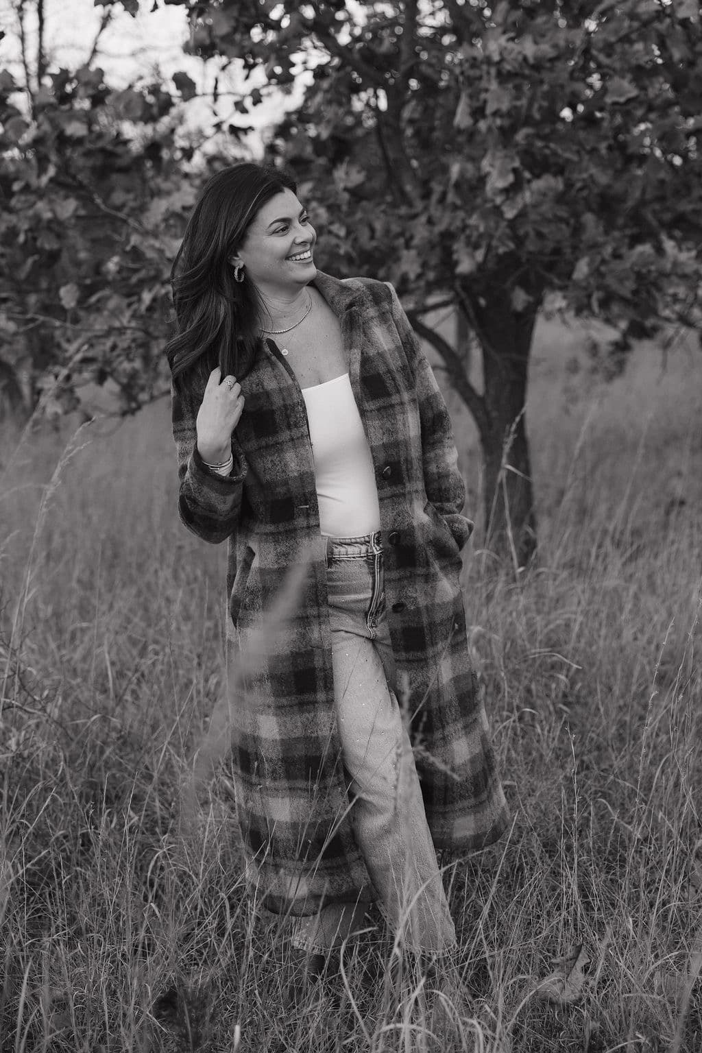 Erin Welsh walking through a field